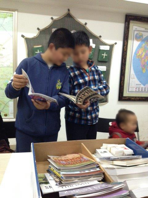 Chinese students reviewing Christian education materials